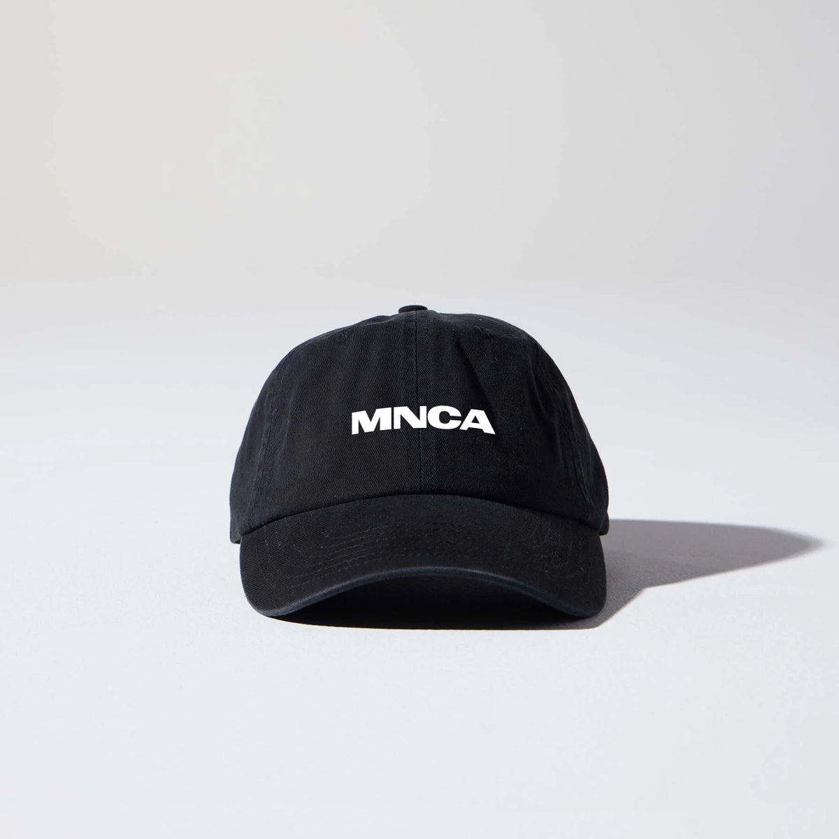 Black unstructured MNCA buckle cap included in the bundle