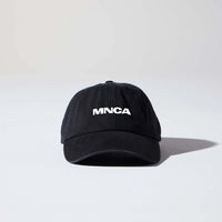 Black unstructured MNCA buckle cap included in the bundle
